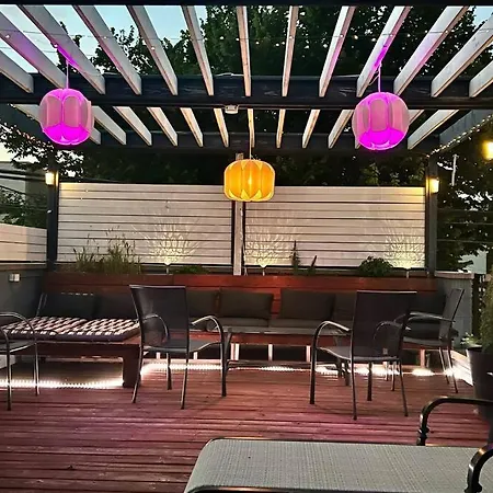 The Banksy-Greystone Rooftop Firepit United Center
