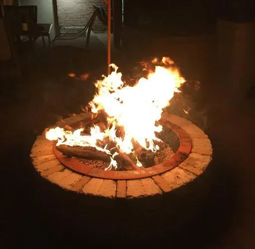 The Banksy-greystone Rooftop Firepit United Center Chicago